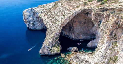 Take a Rowboat through the Blue Grotto