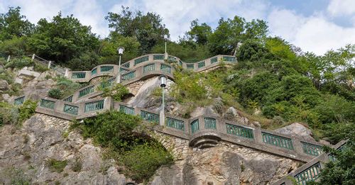 Take the funicular railway to the top of Schlossberg Hill for a panoramic view of Graz