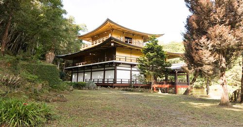 See the reflecting gold rooftops of the Kinkaku-Ji Temple
