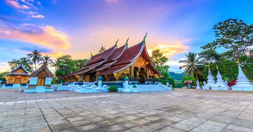 Explore Buddhist art inside the Wat Xieng Thong