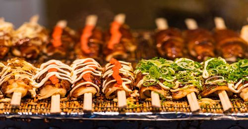 Discover delicious Japanese street food in the Kuromon Market