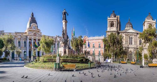 Explore the historical government buildings around Plaza Murilla