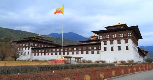 Attend the daily flag ceremony held at the Tashichho Dzong