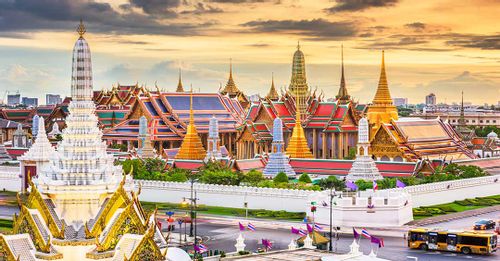 Visit the Temple of the Emerald Buddha inside the Grand Palace
