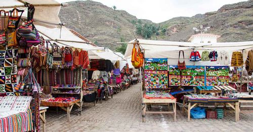 Shop for locally made handicrafts in the Pisac Market to find authentic souvenirs