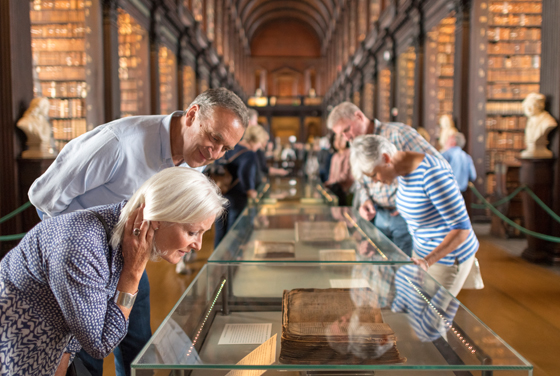 See the Book of Kells in Ireland